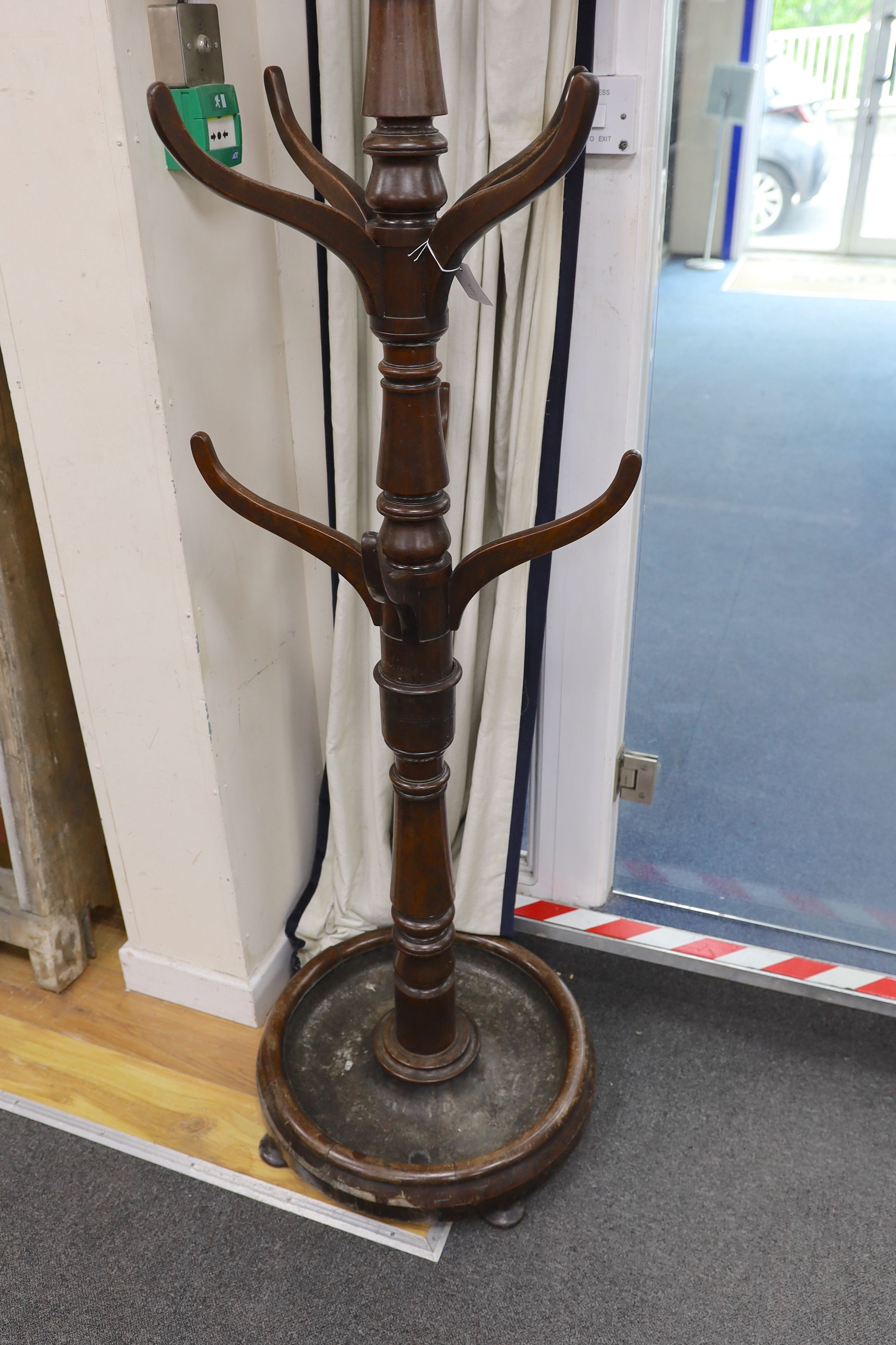 A mid Victorian mahogany hallstand, with circular lead lined base H 194cm.